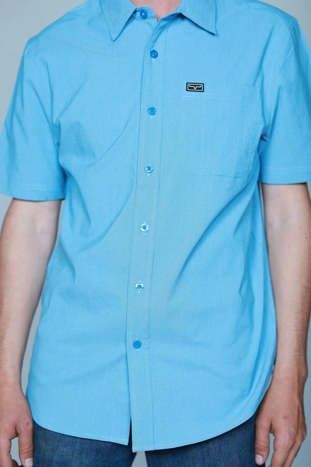 Kimes Ranch Mens Linville Solid Shirt Mid Blue Cotton Blend S/S Wardrobe Staple Double Stitched Hems